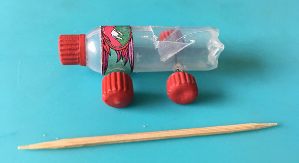 miniature water bottle toy car smaller than a tooth pick